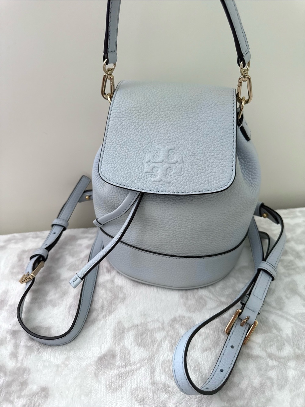 Tory Burch Thea Powder Blue Pebbled Leather Mini Bucket Backpack Drawstring